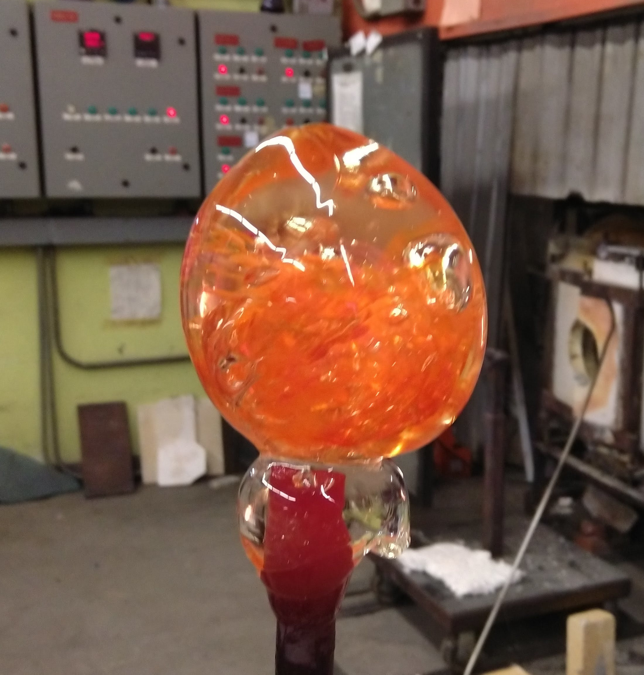 lumpy glass on a stick