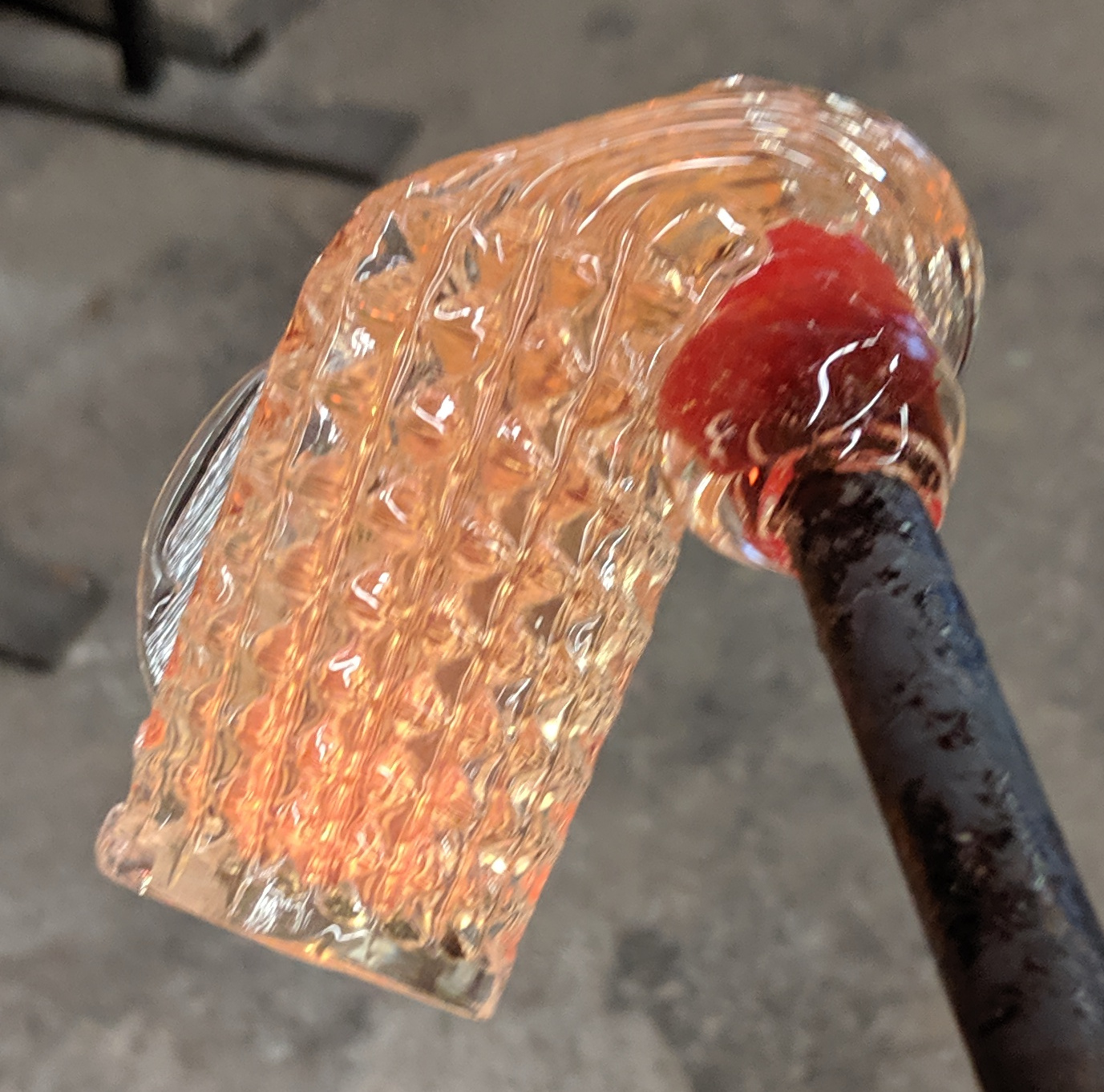 A droopy solid hunk of glass after it comes out of the pineapple mold